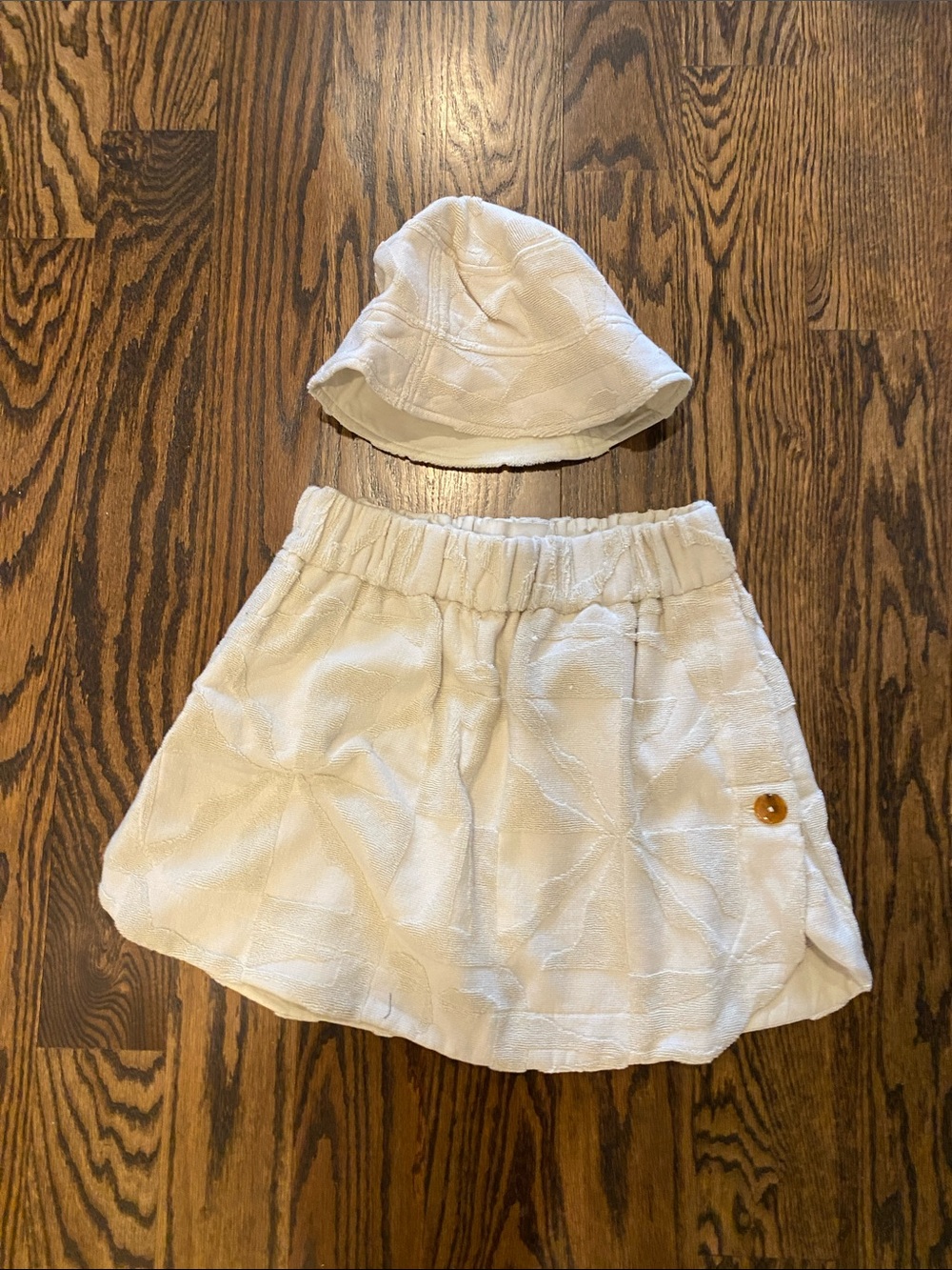 Women’s Cream Textured Skirt with Matching Bucket Hat.Australian brand Lucy Folk
